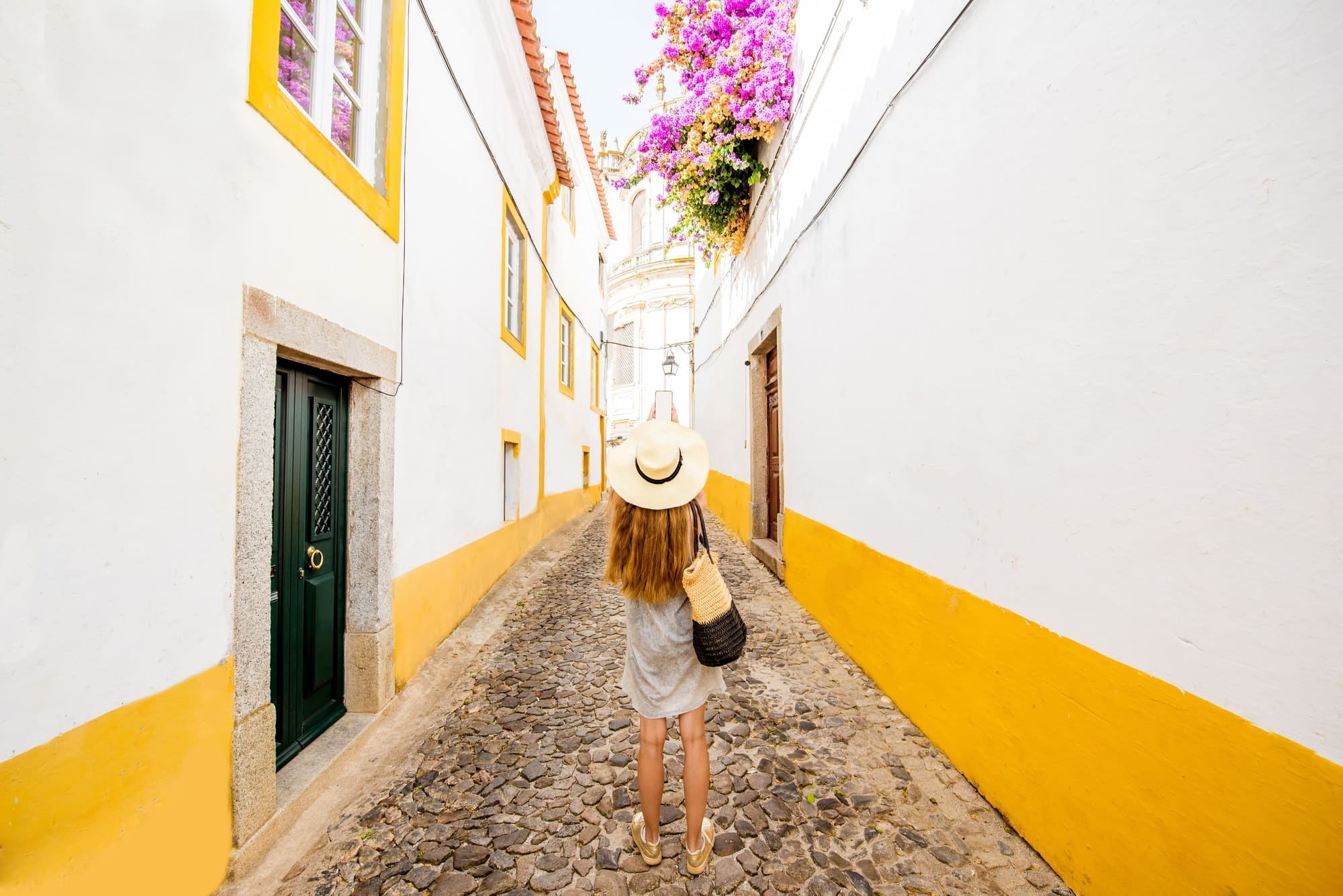 Woman traveling in Evora, Portugal